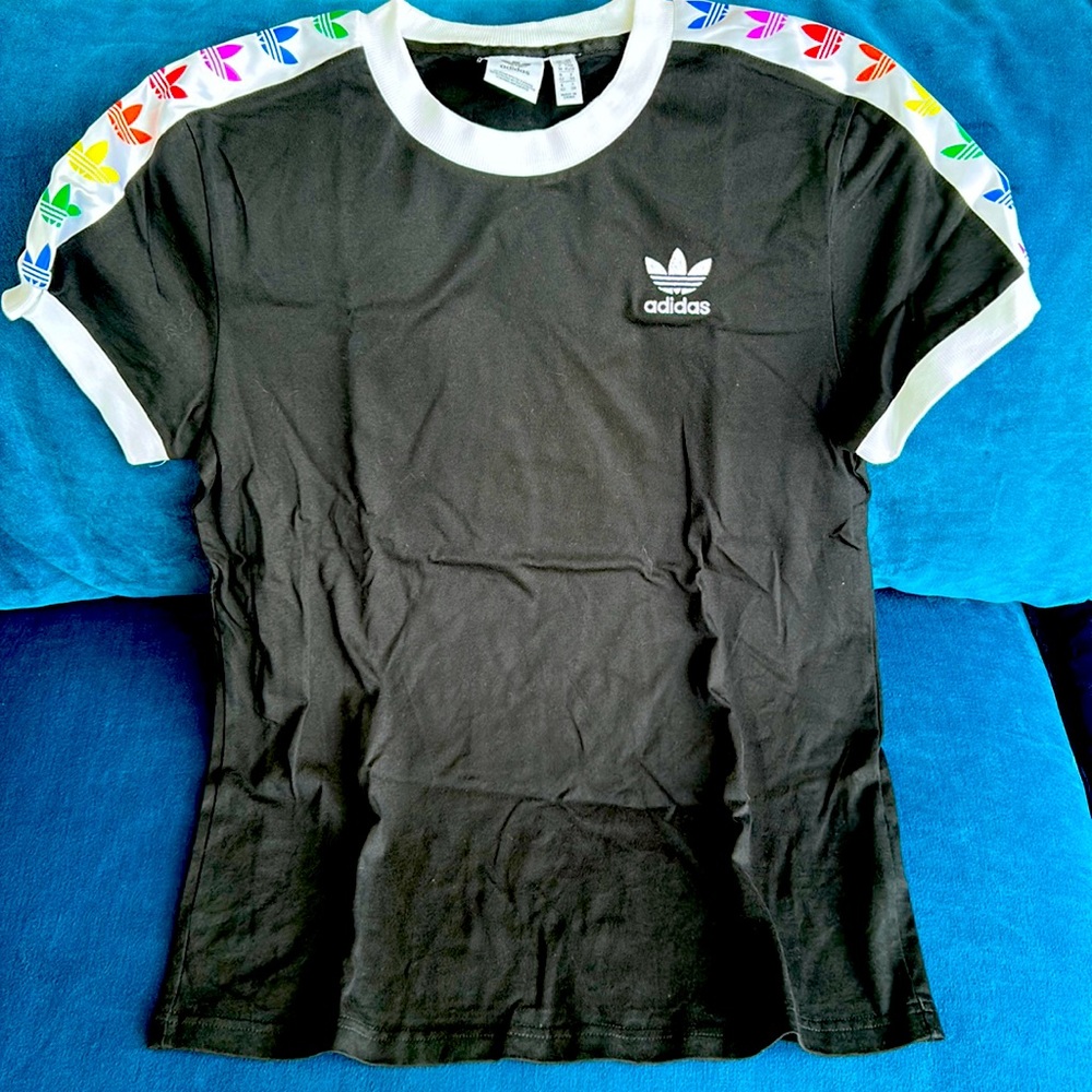 Adidas black cap sleeve t shirt with rainbow colored logos across shoulders.